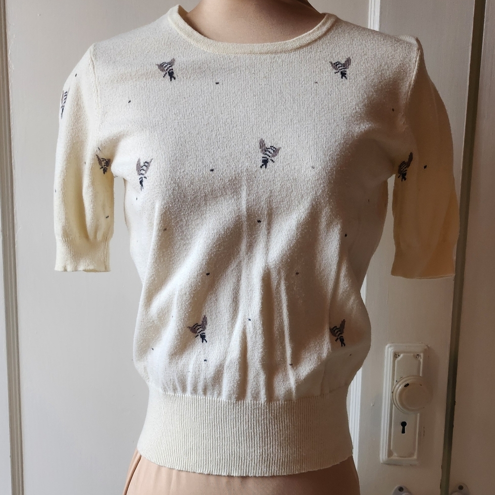 Cooperative Cream Short-Sleeve Crewneck Sweater with Navy Bee Embroidery